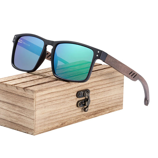 Sunglasses with blue-tinted lenses on a wooden box, featuring the BARCUR brand.